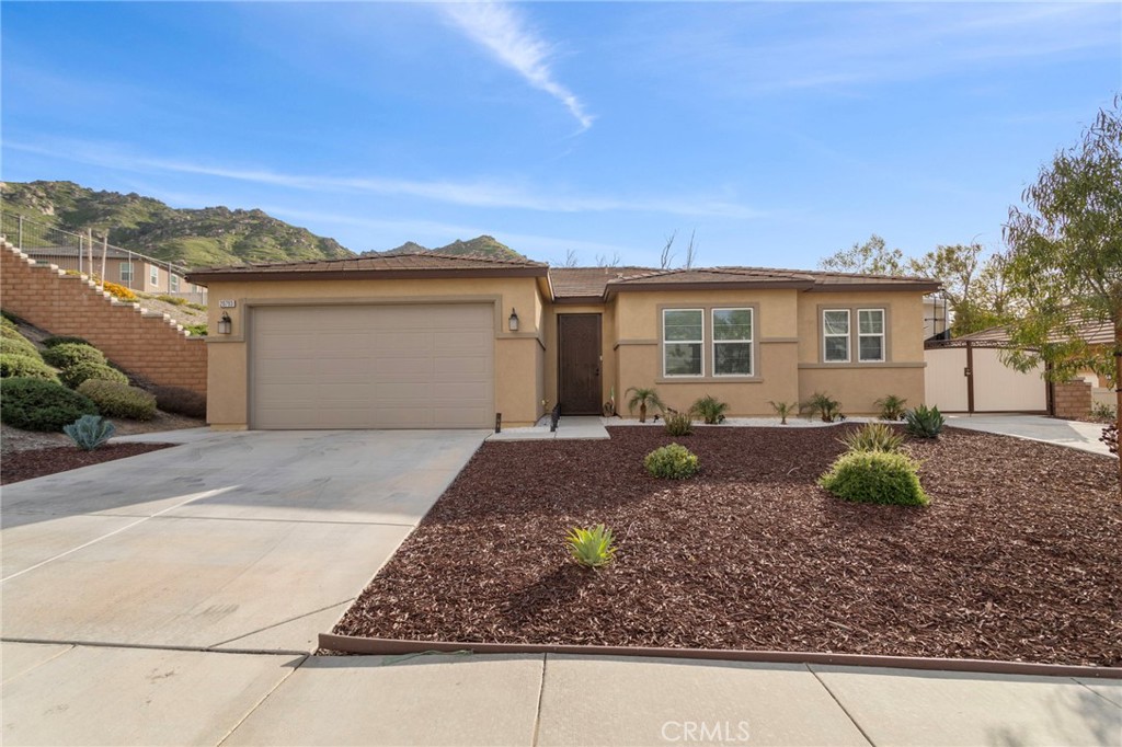 20793 Spring Mountain Road Riverside, CA 92507 - Photo 1 of 1 a view of a house with a yard
