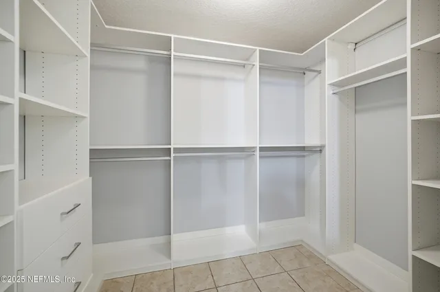 a view of an empty walk in closet