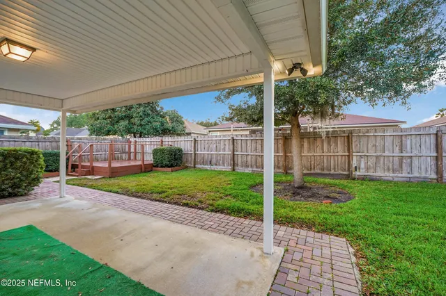 a view of a backyard with a garden