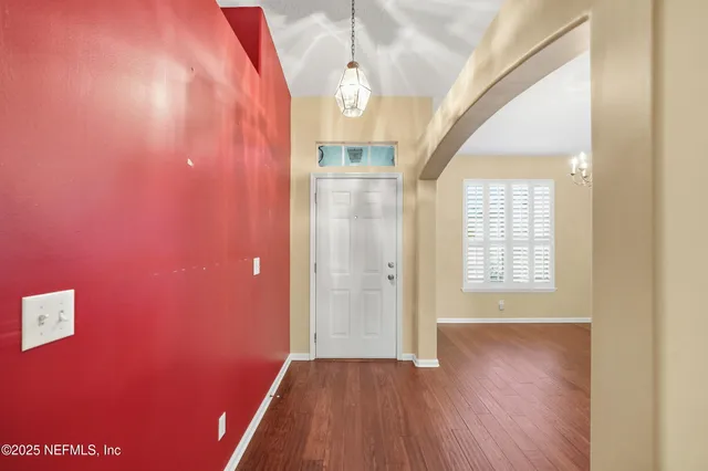 a view of livingroom with hardwood floor and window