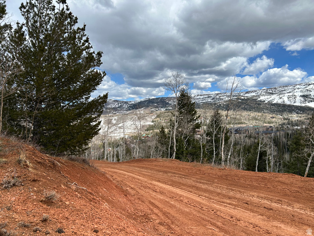 524 West Ski View Drive Brian Head, UT 84719 - Photo 4 of 11 Expansive land parcel featuring rich red soil and a prepared level area