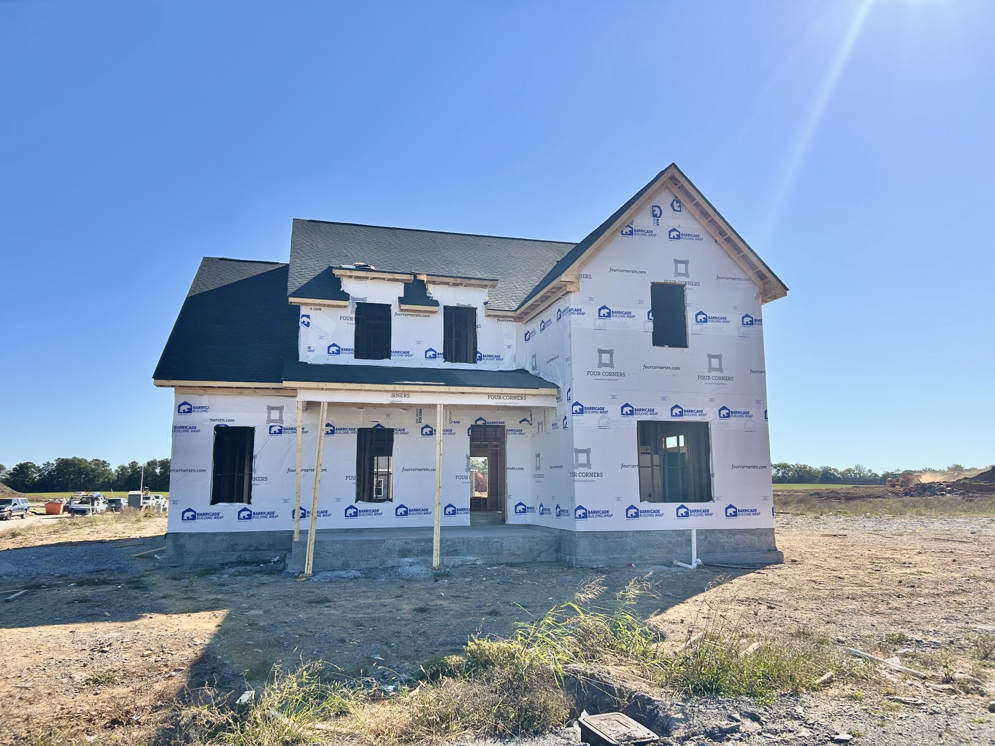 front view of a house with a yard