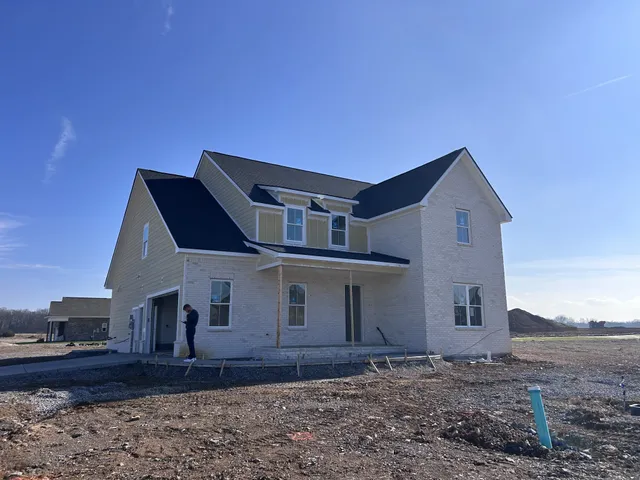 a house view with a backyard space