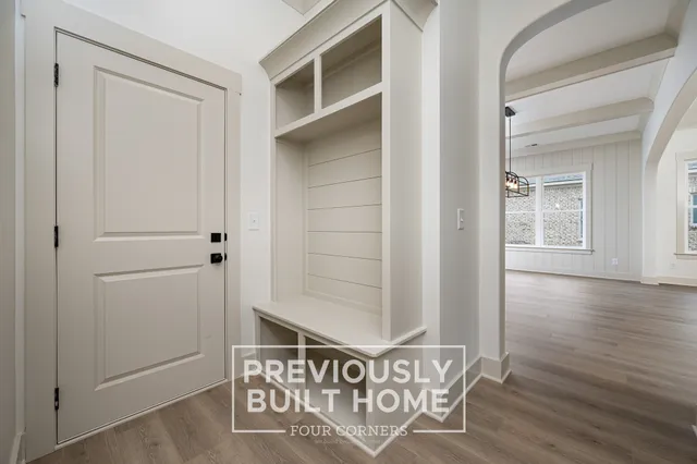 a view of livingroom with hardwood floor and a ceiling fan