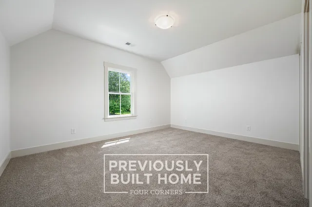 a kitchen with a sink and a refrigerator