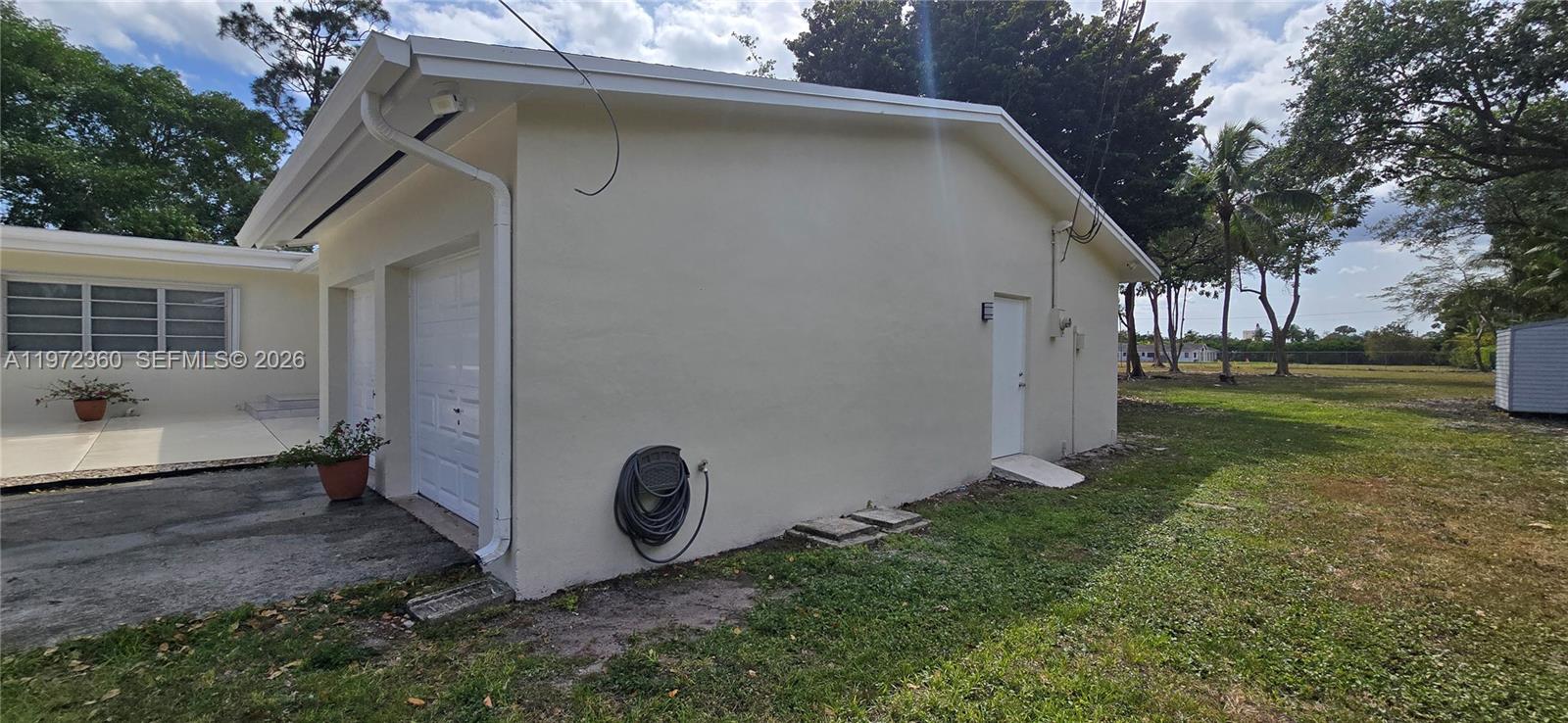 6500 Southwest 82nd Avenue Miami, FL 33143 - Photo 45 of 54 a view of a back yard of the house