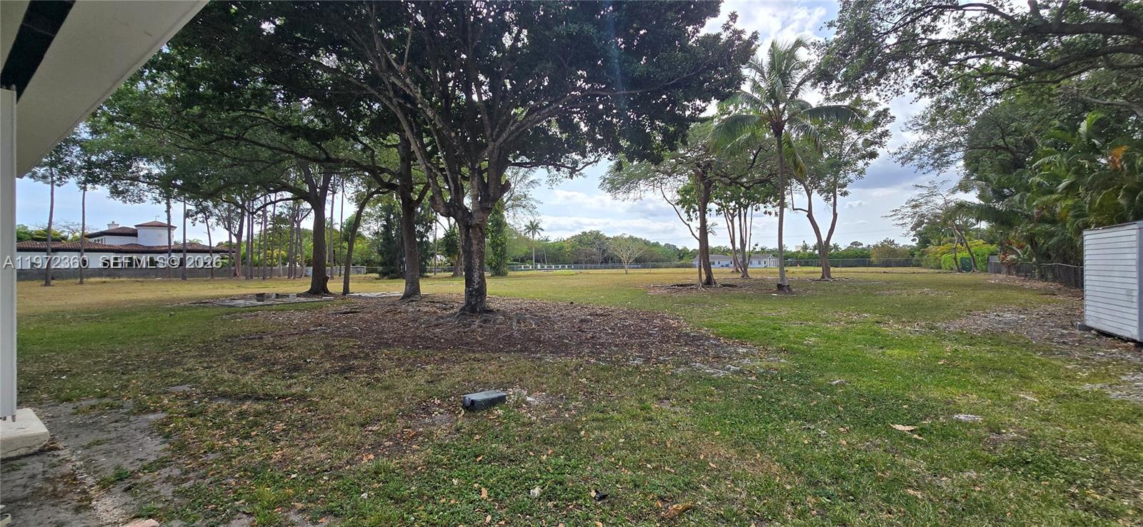 6500 Southwest 82nd Avenue Miami, FL 33143 - Photo 46 of 54 a view of outdoor space with deck and trees
