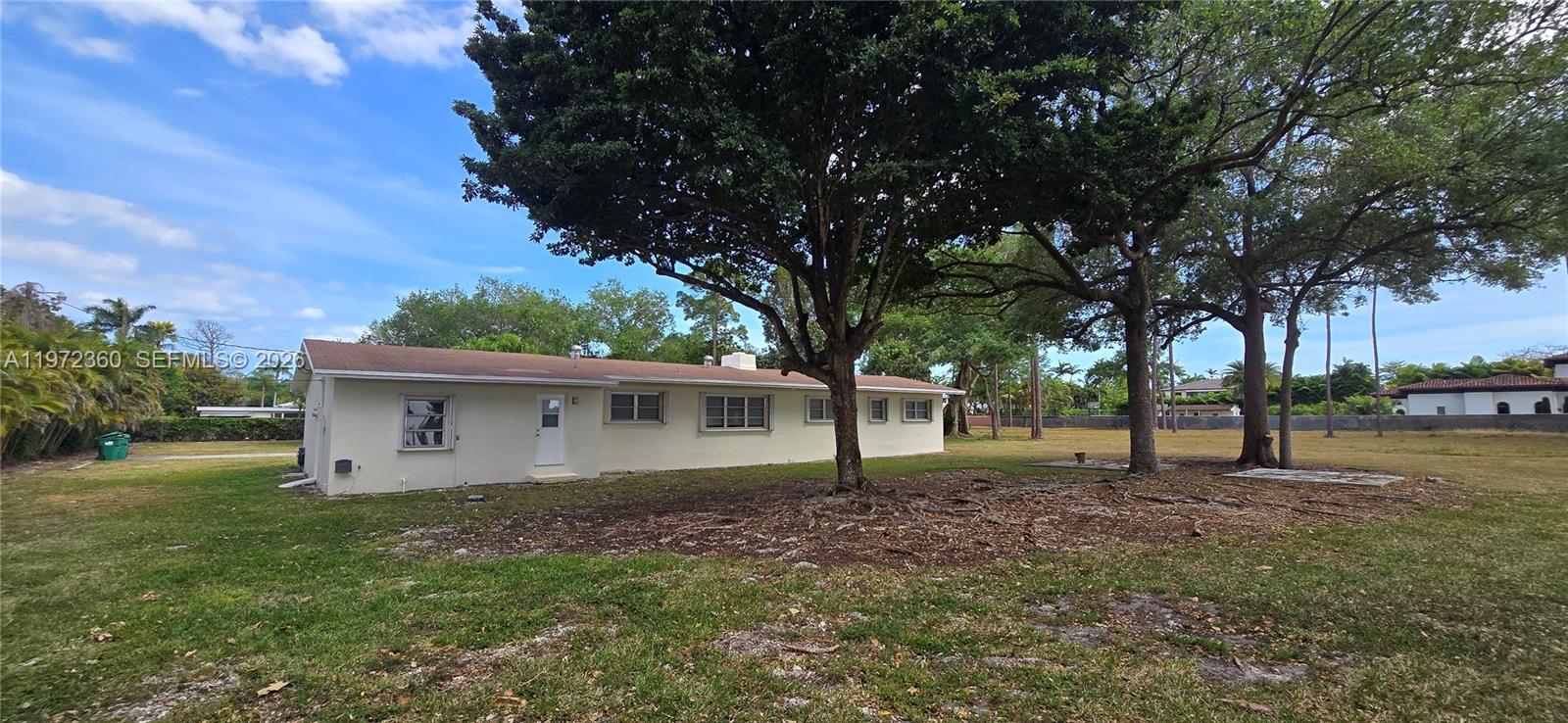 6500 Southwest 82nd Avenue Miami, FL 33143 - Photo 47 of 54 a house view with a backyard space