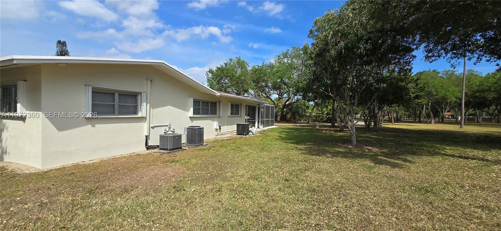 6500 Southwest 82nd Avenue Miami, FL 33143 - Photo 51 of 54 a view of a house with a yard