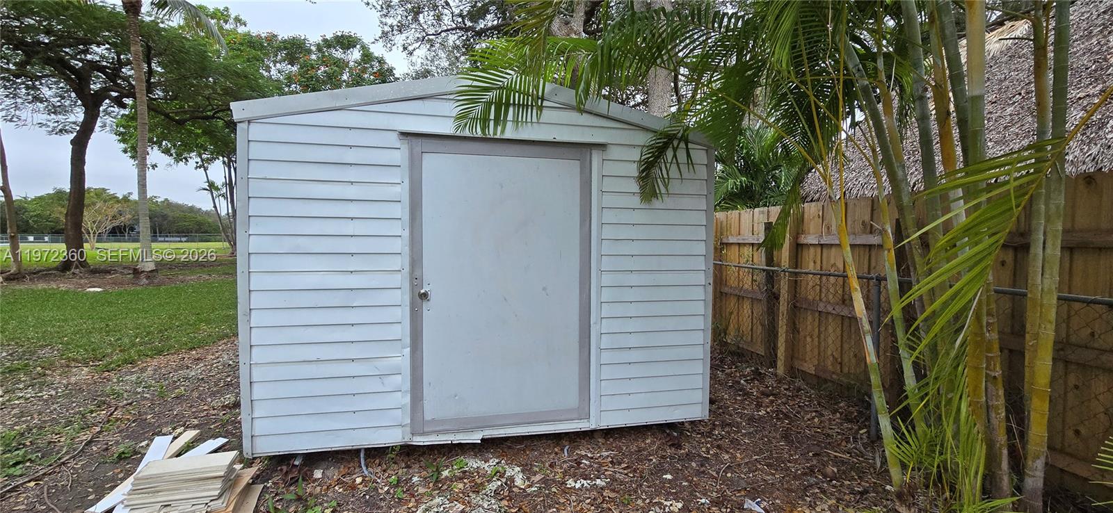 6500 Southwest 82nd Avenue Miami, FL 33143 - Photo 53 of 54 a view of a house with a yard