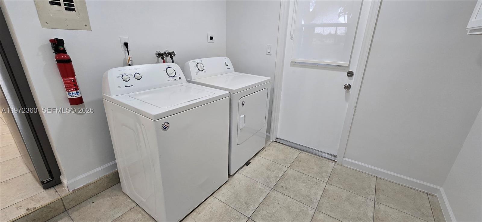 6500 Southwest 82nd Avenue Miami, FL 33143 - Photo 8 of 54 a utility room with dryer and washer