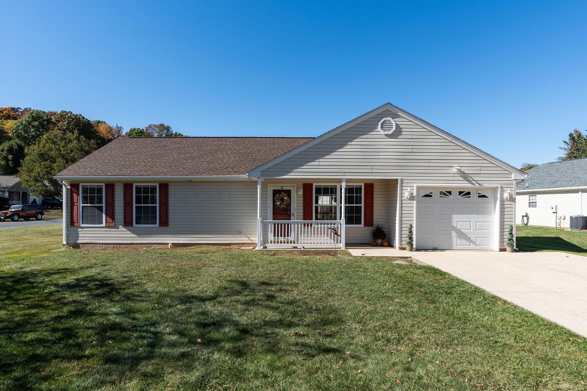 300 Robinhood Road Staunton, VA 24401 - Photo 1 of 51 a front view of a house with a garden and yard