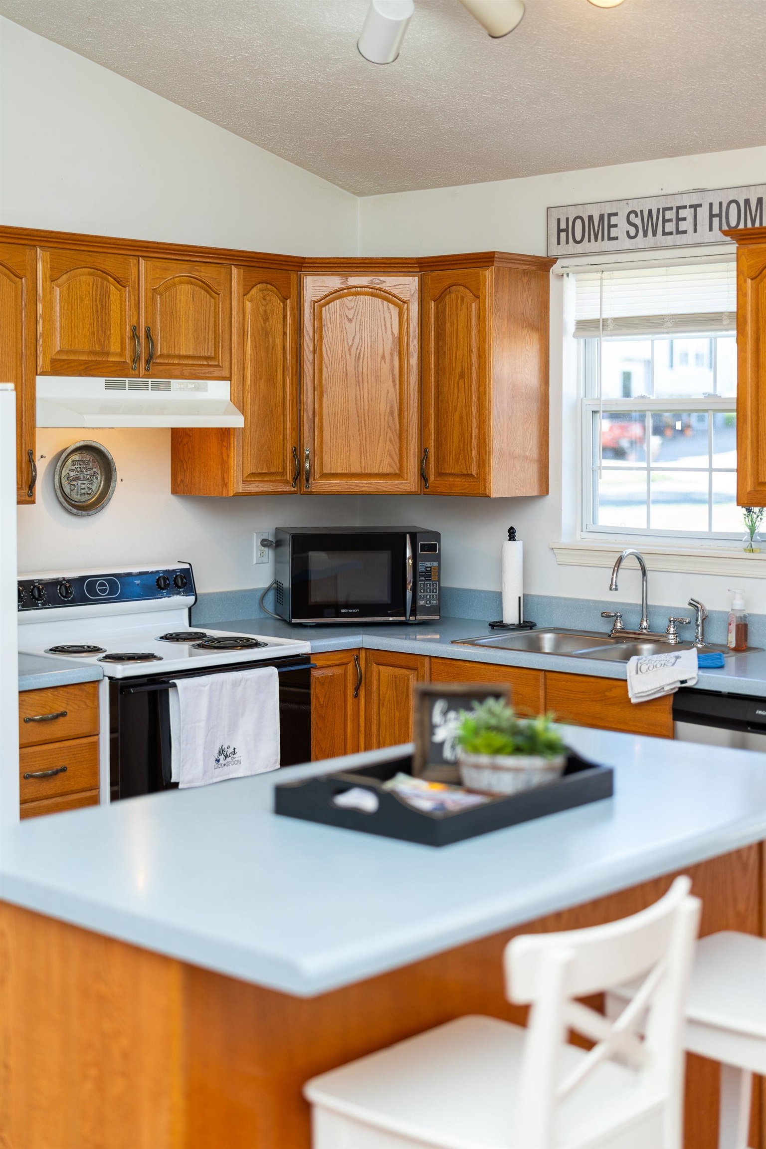 300 Robinhood Road Staunton, VA 24401 - Photo 15 of 51 a kitchen with stainless steel appliances granite countertop a stove a sink and a microwave