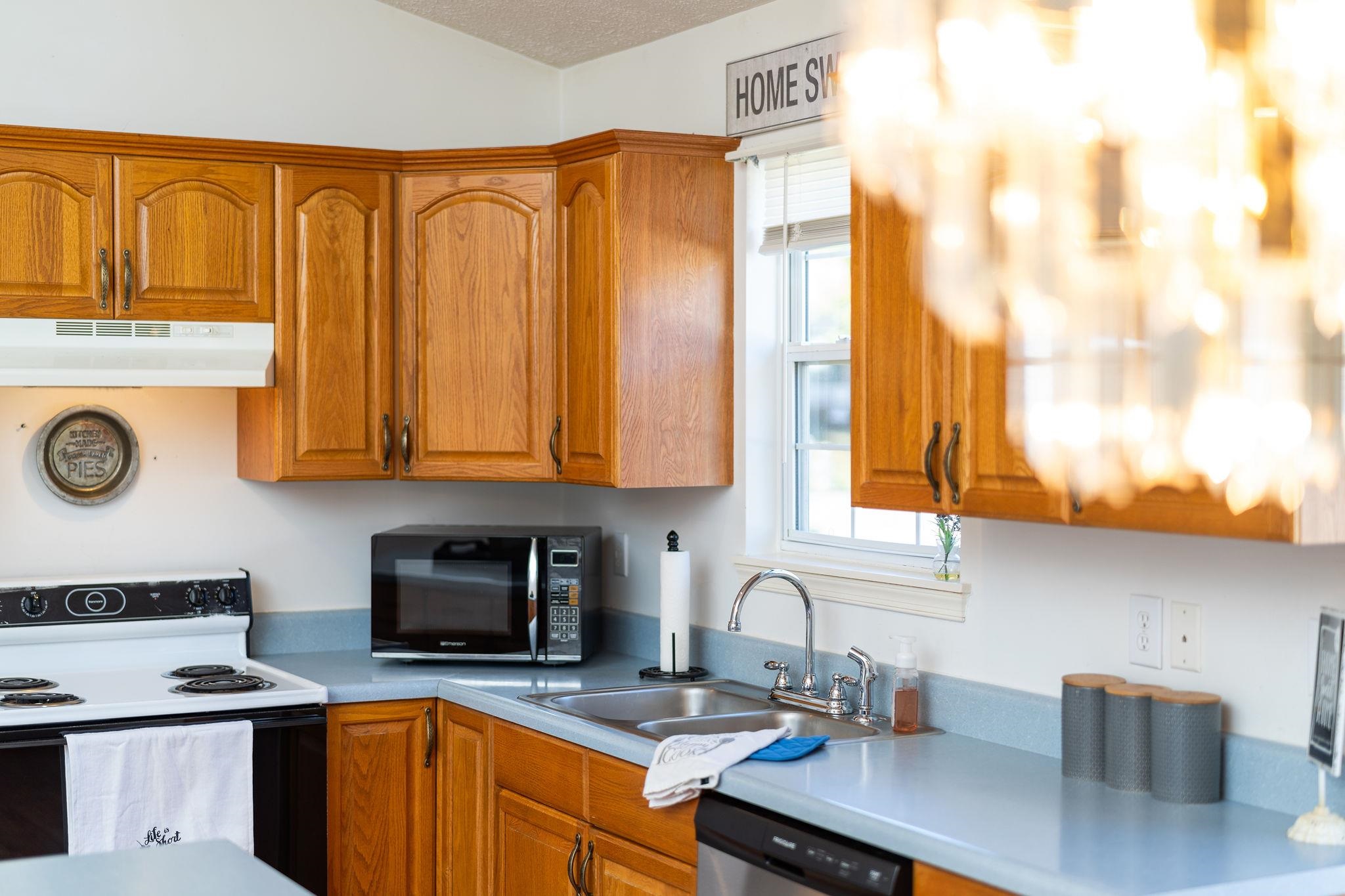 300 Robinhood Road Staunton, VA 24401 - Photo 20 of 51 a kitchen with a sink and a stove top oven