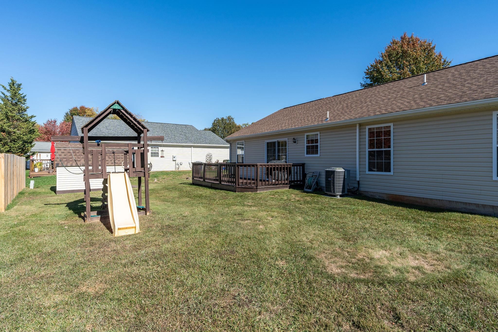 300 Robinhood Road Staunton, VA 24401 - Photo 50 of 51 a view of a house with backyard porch and wooden fence