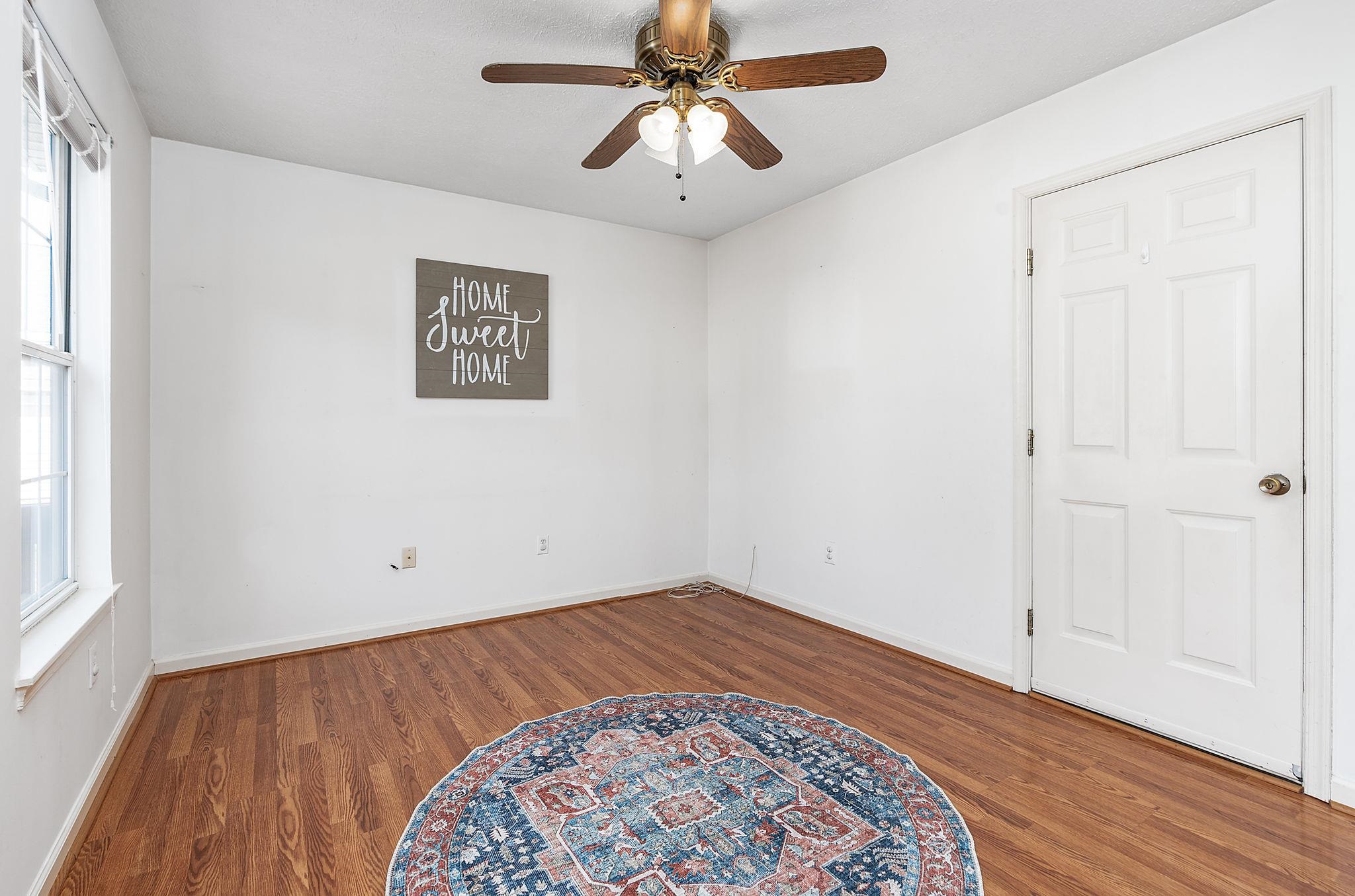 300 Robinhood Road Staunton, VA 24401 - Photo 10 of 51 wooden floor in an empty room with a window