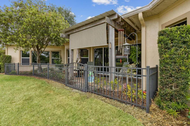 an aerial view of a house with a garden