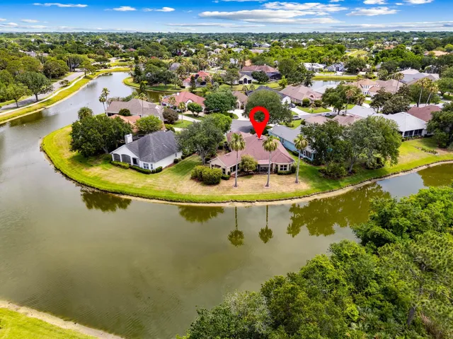 a bathroom with a granite countertop sink mirror and double