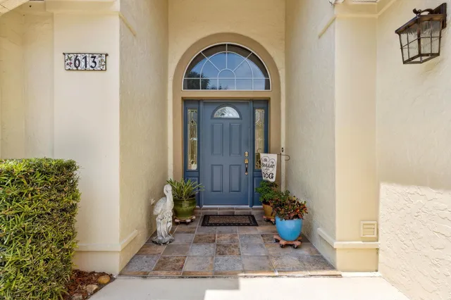 a view of living room filled with furniture and outdoor space