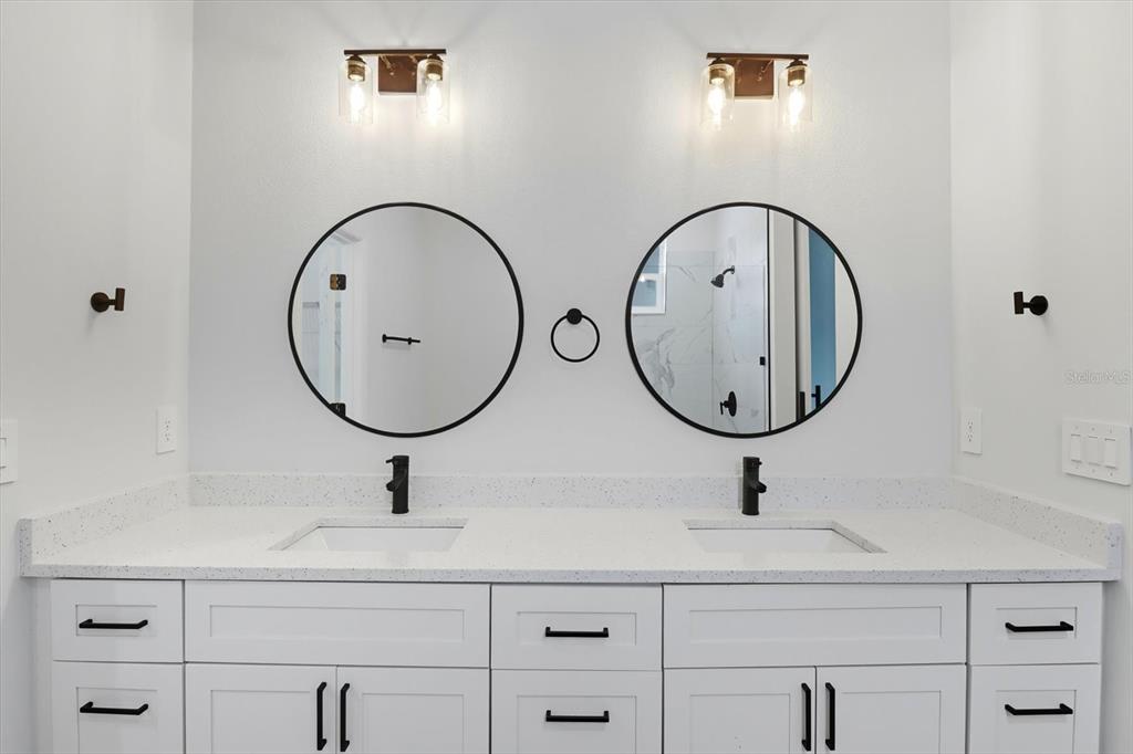 6716 East Crimson Lane Inverness, FL 34452 - Photo 25 of 44 a bathroom with a sink and a mirror