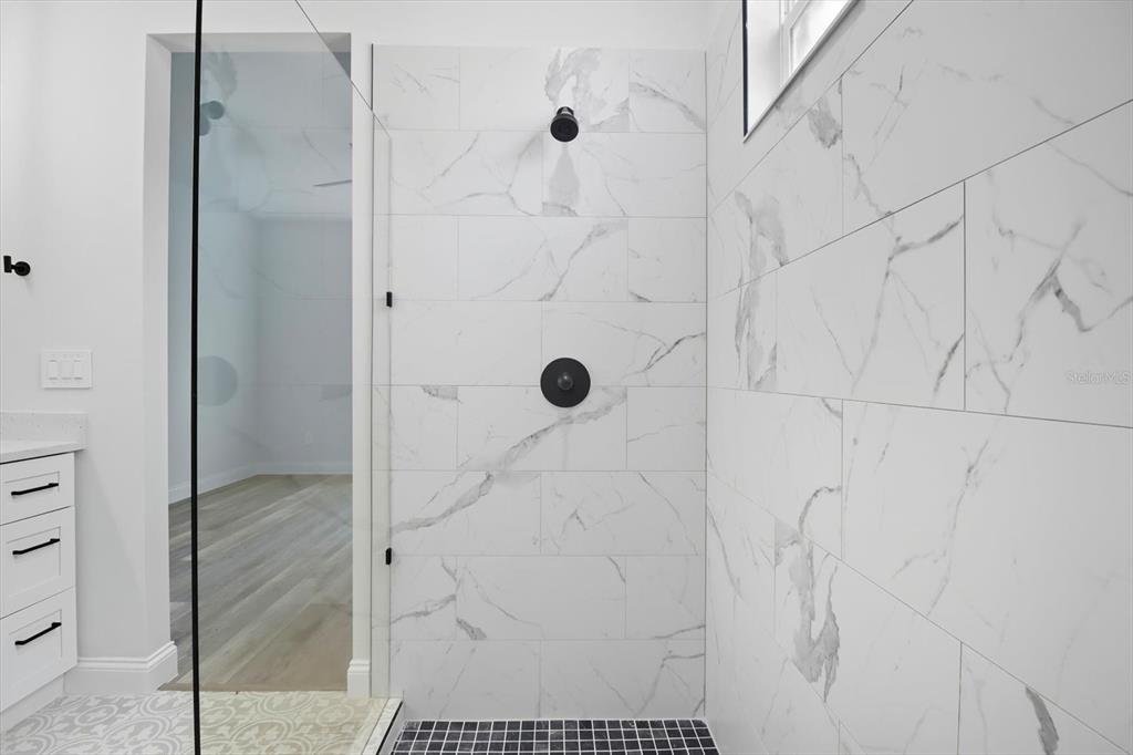 6716 East Crimson Lane Inverness, FL 34452 - Photo 26 of 44 a bathroom with a shower