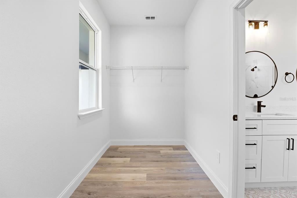 6716 East Crimson Lane Inverness, FL 34452 - Photo 27 of 44 a view of a room with cabinet