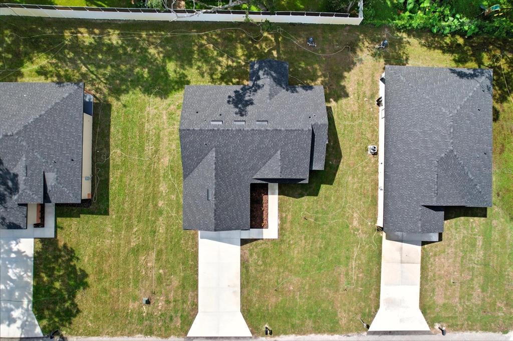 6716 East Crimson Lane Inverness, FL 34452 - Photo 40 of 44 aerial view of a house with a garden