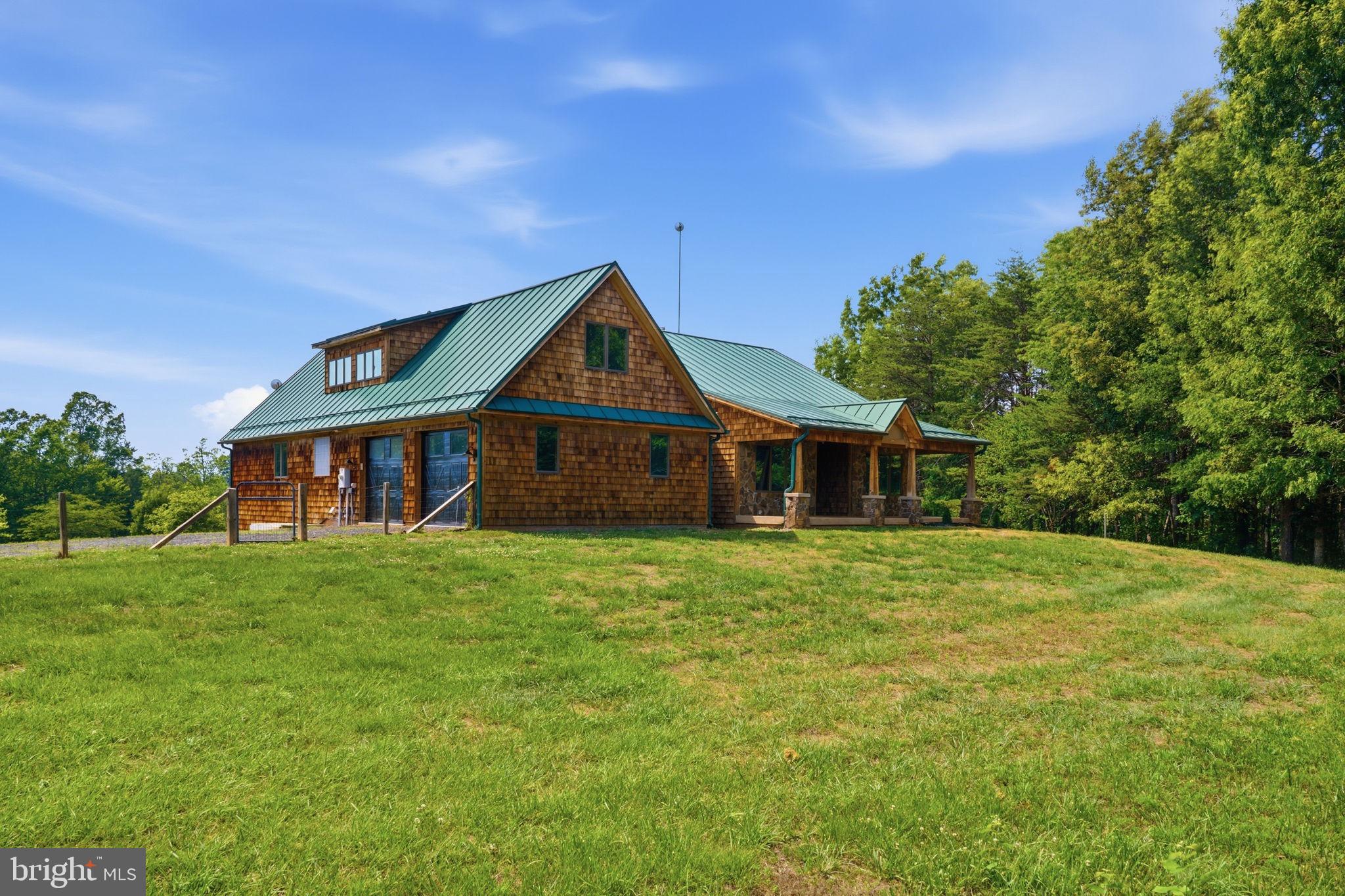 7522 Stubbs Bridge Road Spotsylvania, VA 22551 - Photo 60 of 60 a front view of a house with garden