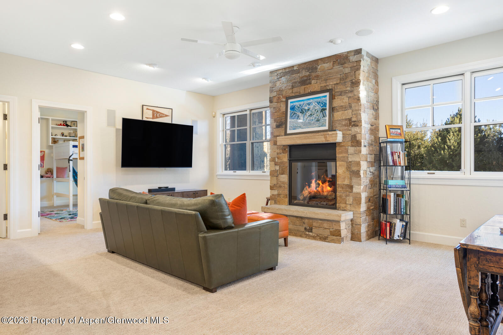 36 Pinnacle Point Edwards, CO 81632 - Photo 26 of 43 a living room with fireplace furniture and a flat screen tv