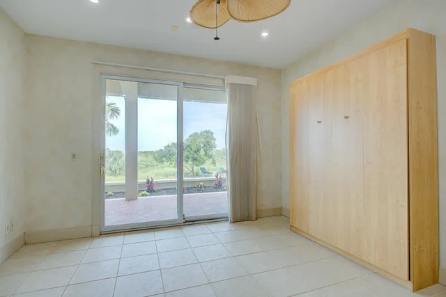 a view of a yard with flower plants