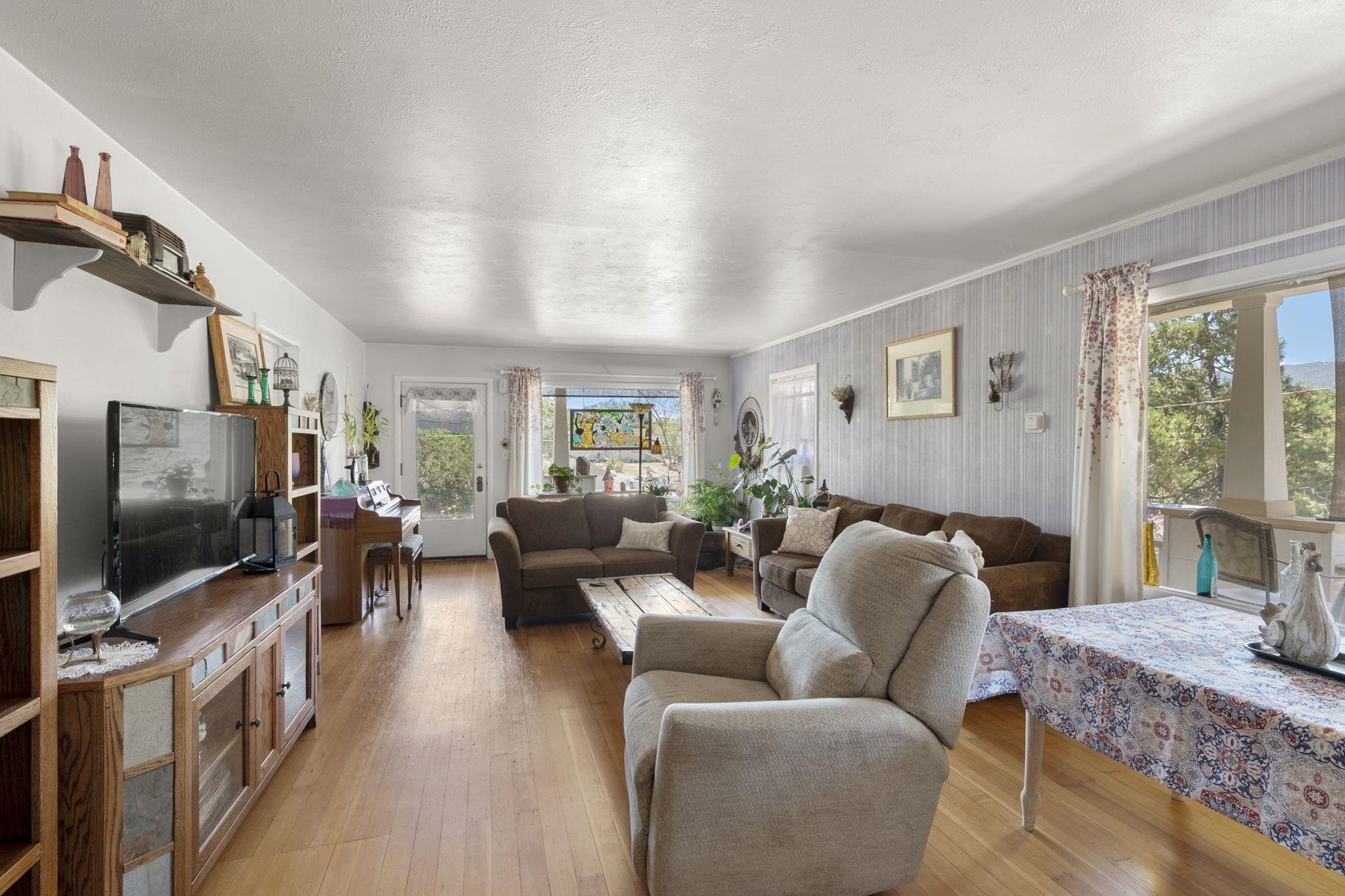 213 Main Street San Andreas, CA 95249 - Photo 12 of 53 a living room with furniture and a flat screen tv