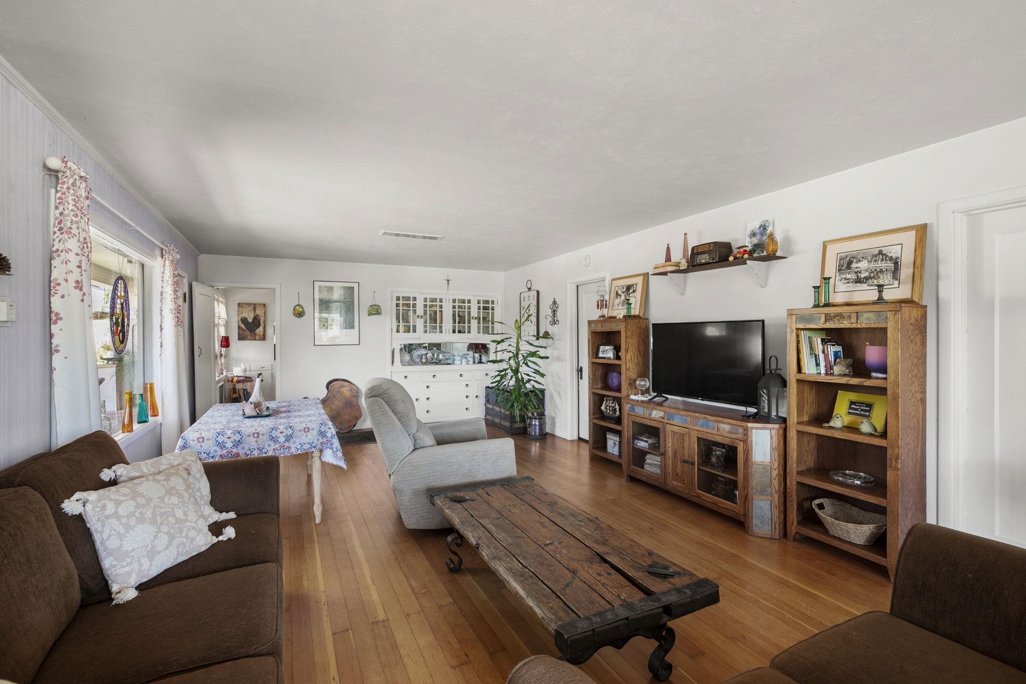 213 Main Street San Andreas, CA 95249 - Photo 14 of 53 a living room with furniture and a flat screen tv