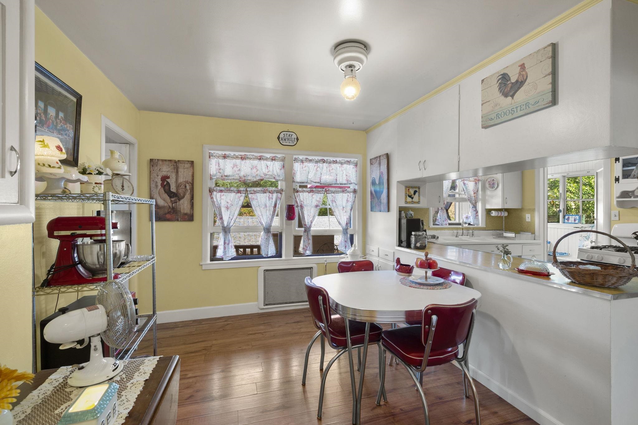 213 Main Street San Andreas, CA 95249 - Photo 18 of 53 a view of a dining room with furniture and chandelier