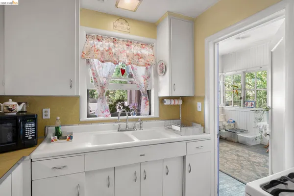 a view of bathroom with dual sinks