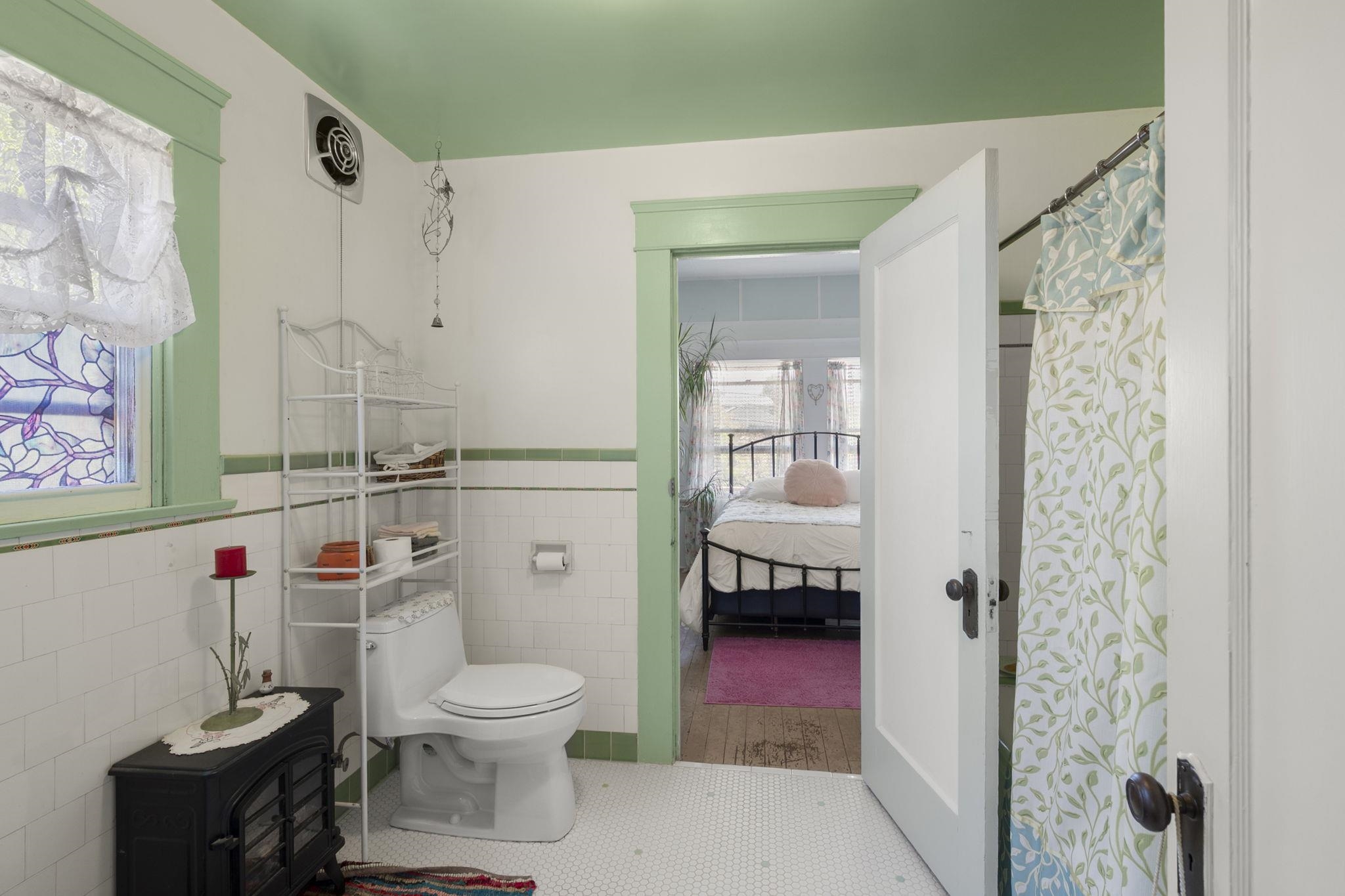 213 Main Street San Andreas, CA 95249 - Photo 29 of 53 a bathroom with a toilet and a shower