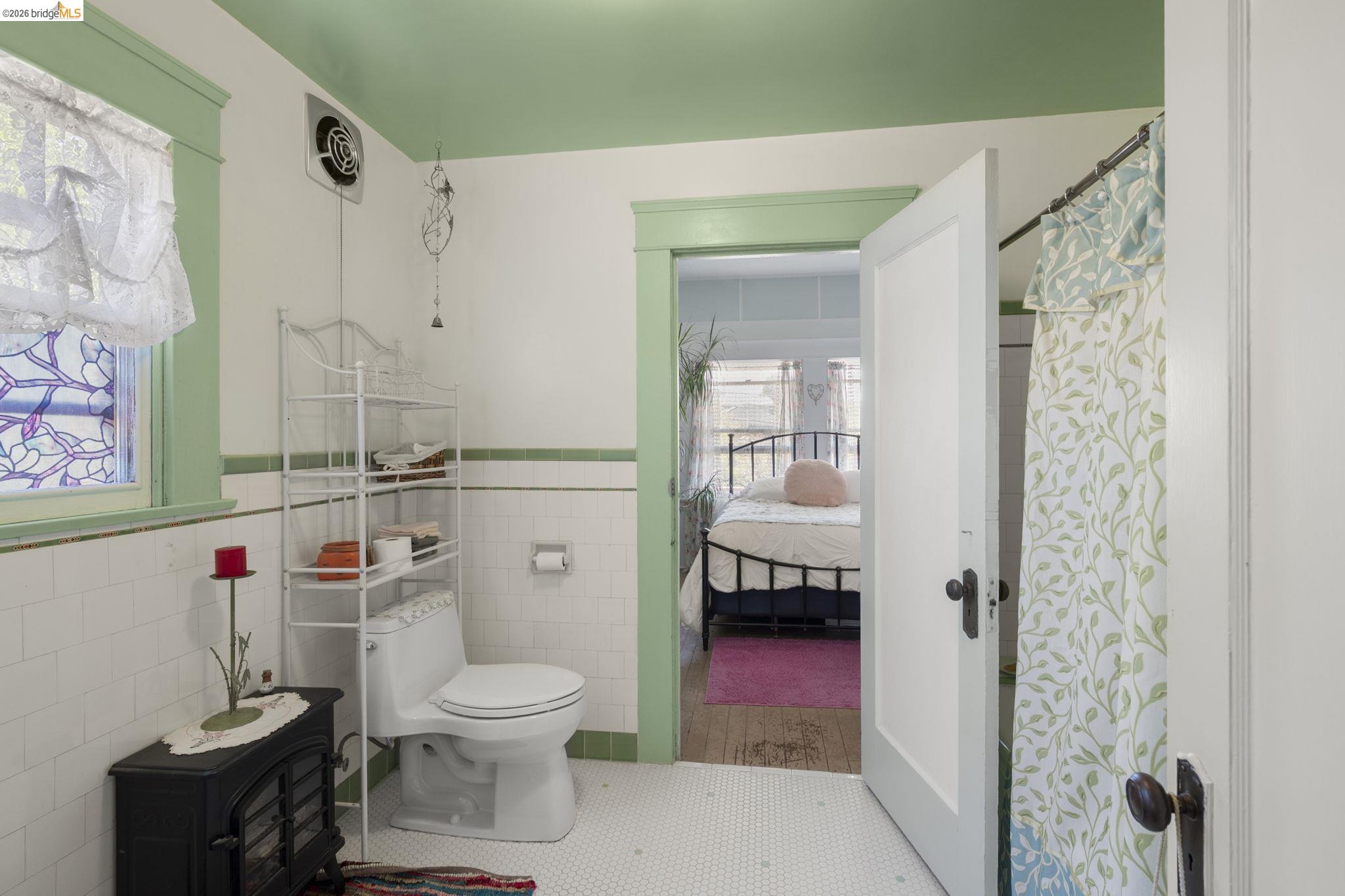 213 Main Street San Andreas, CA 95249 - Photo 29 of 55 a bathroom with a toilet and a shower
