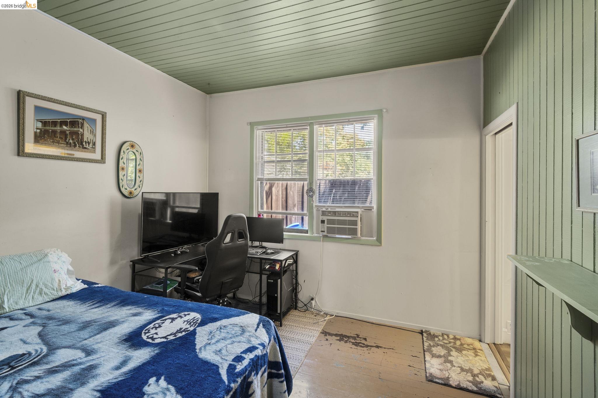 213 Main Street San Andreas, CA 95249 - Photo 35 of 55 a bedroom with furniture and a window
