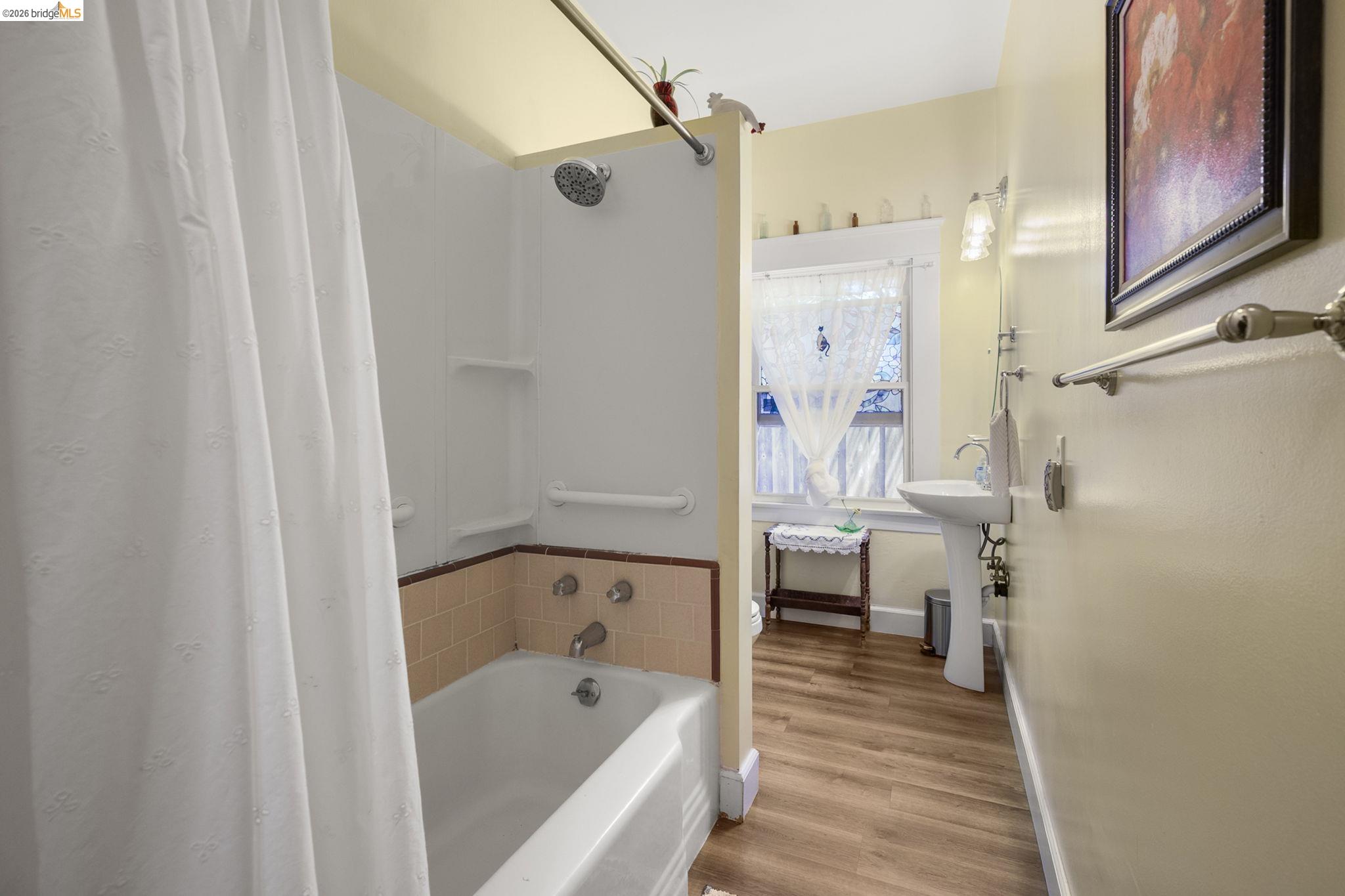213 Main Street San Andreas, CA 95249 - Photo 37 of 55 a bathroom with a bathtub and a shower
