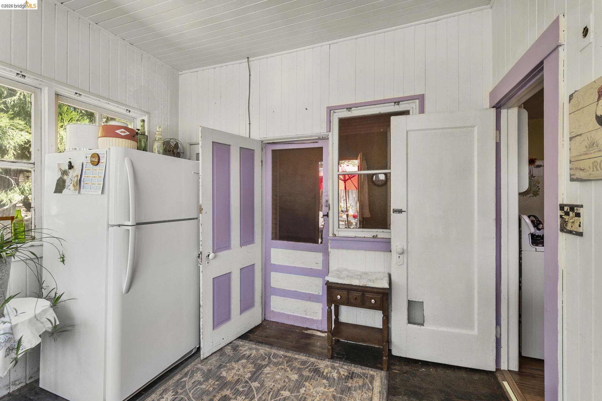 213 Main Street San Andreas, CA 95249 - Photo 39 of 55 a white refrigerator freezer and a stove sitting inside of a kitchen