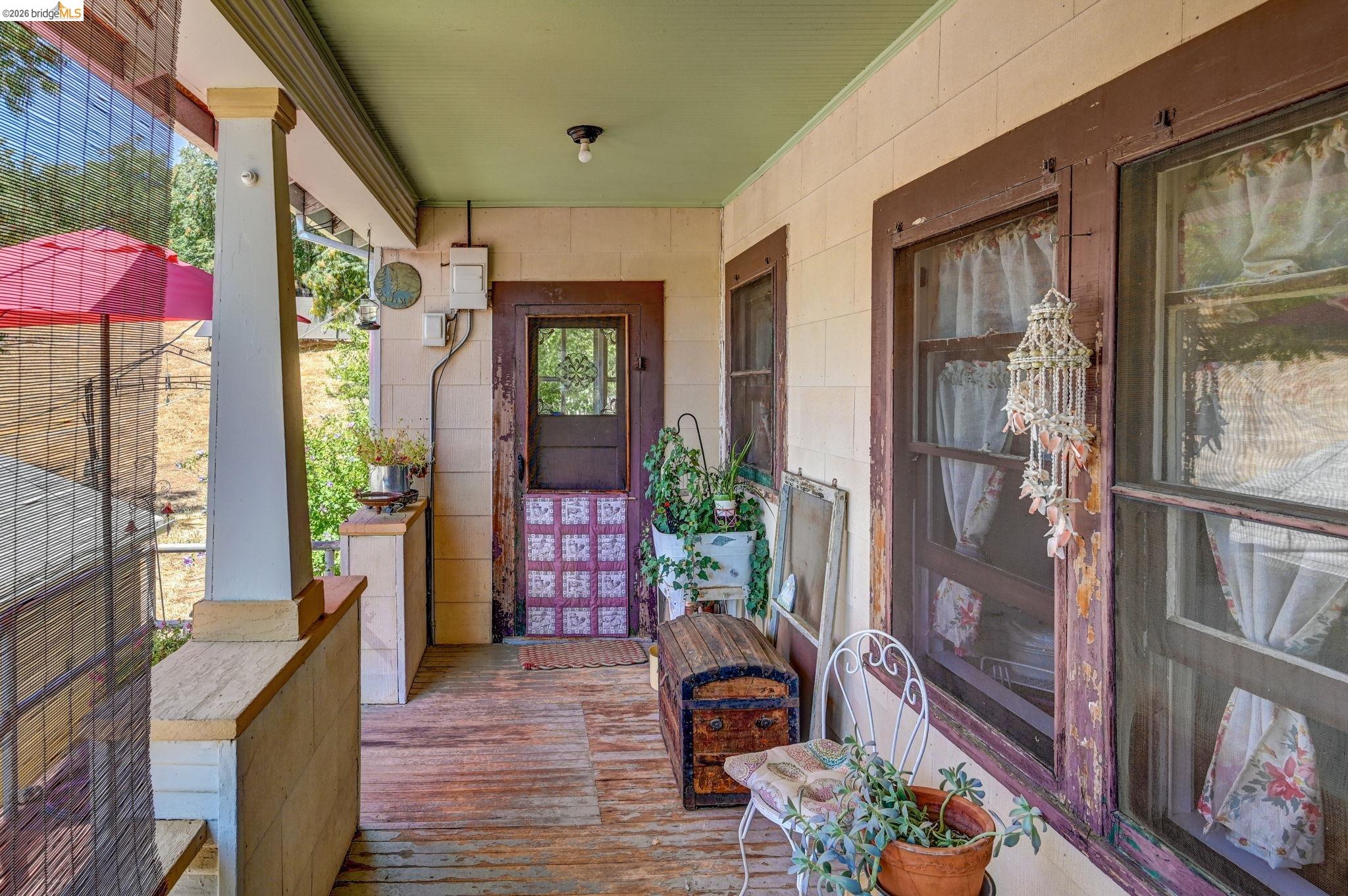 213 Main Street San Andreas, CA 95249 - Photo 40 of 55 a front view of a house with outdoor seating