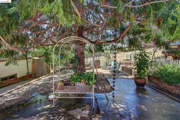 a view of a fence with a trees