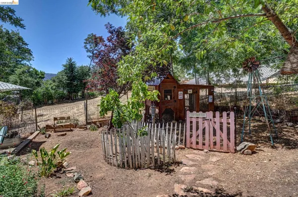 an outdoor space with furniture and umbrella