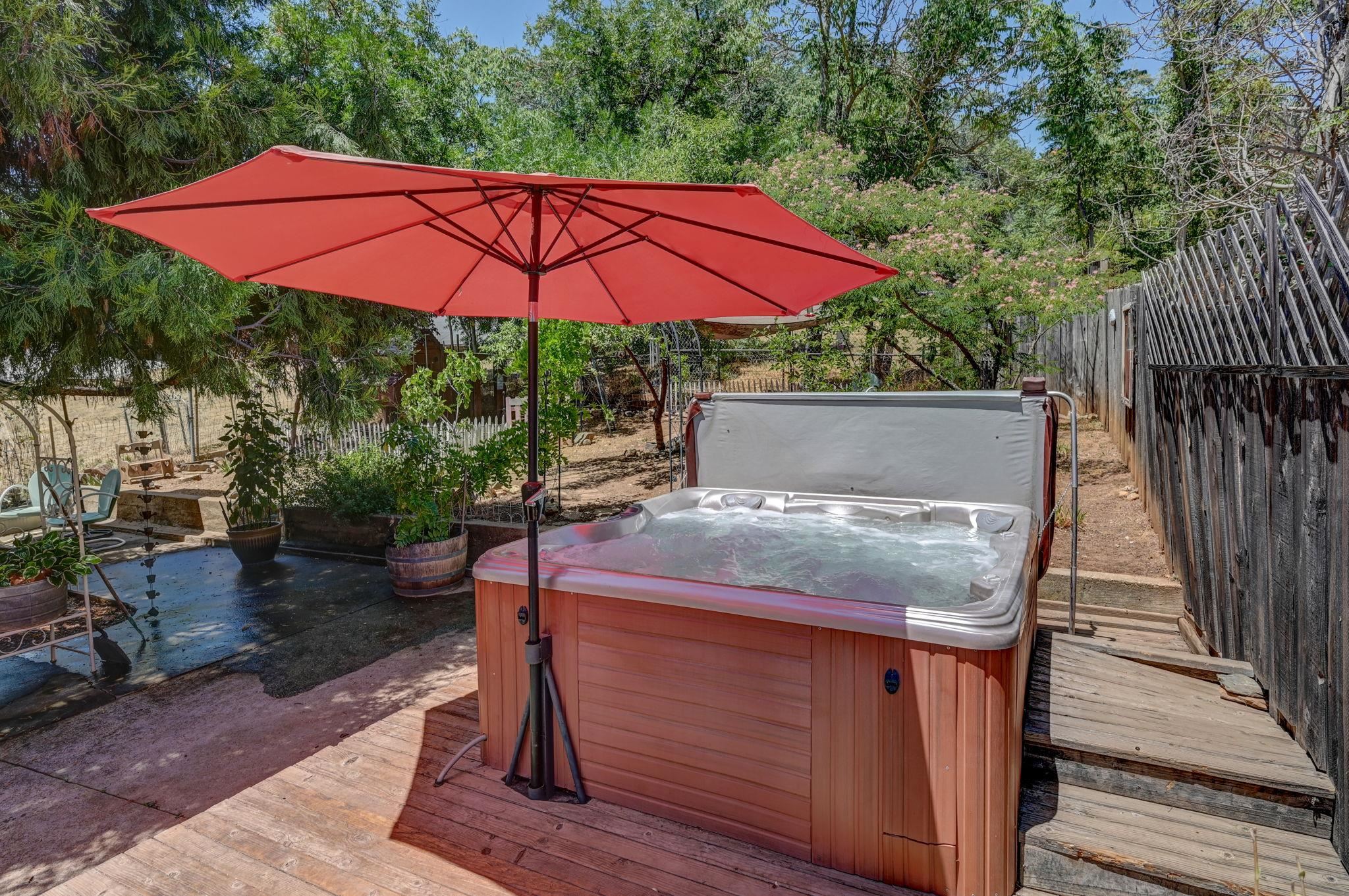 213 Main Street San Andreas, CA 95249 - Photo 50 of 53 an outdoor space with furniture and umbrella
