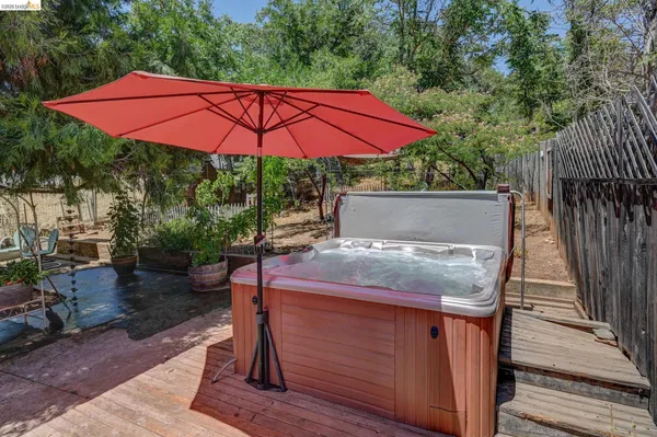 a view of a backyard of the house