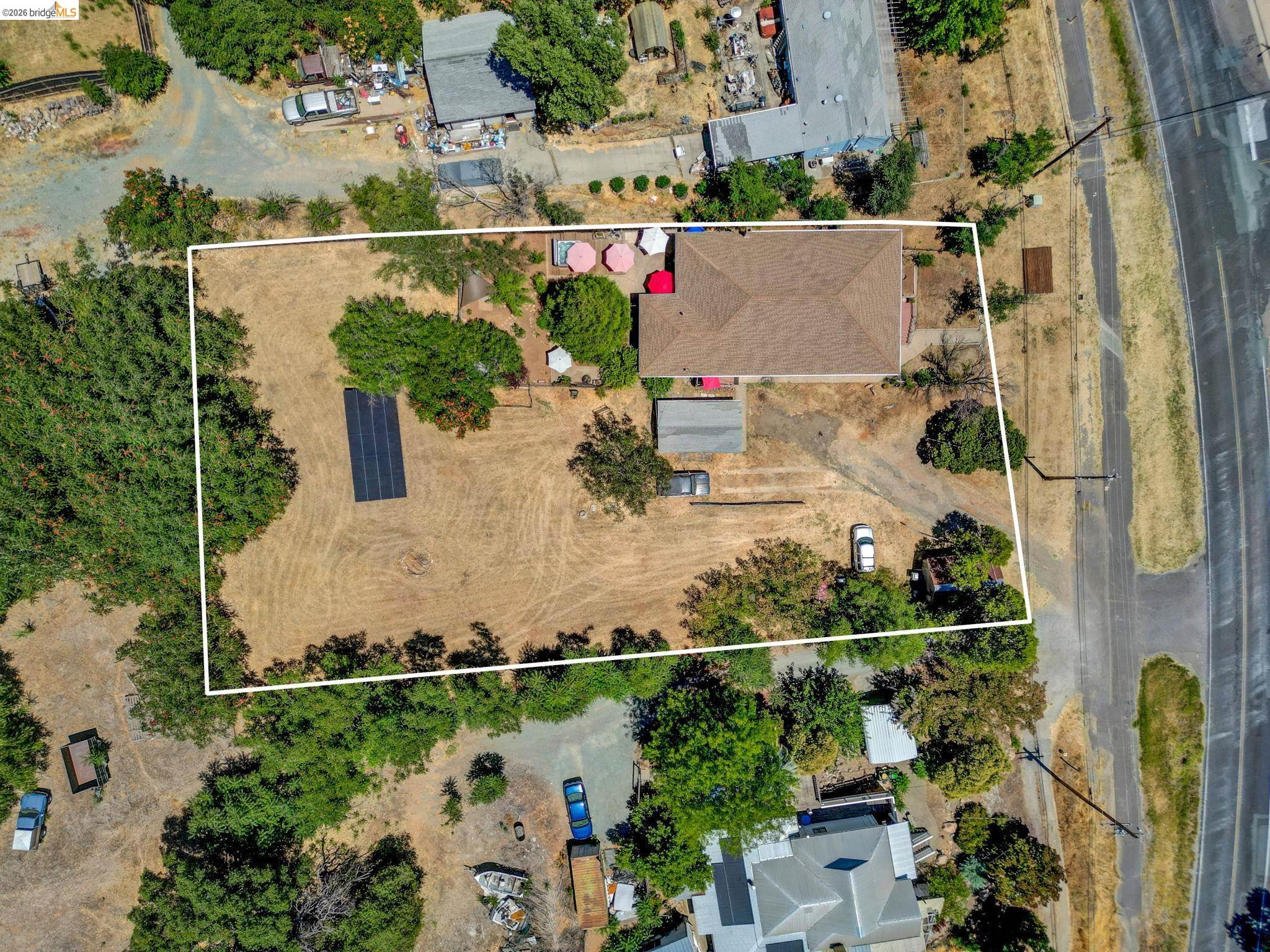 213 Main Street San Andreas, CA 95249 - Photo 6 of 55 an aerial view of a house with outdoor space