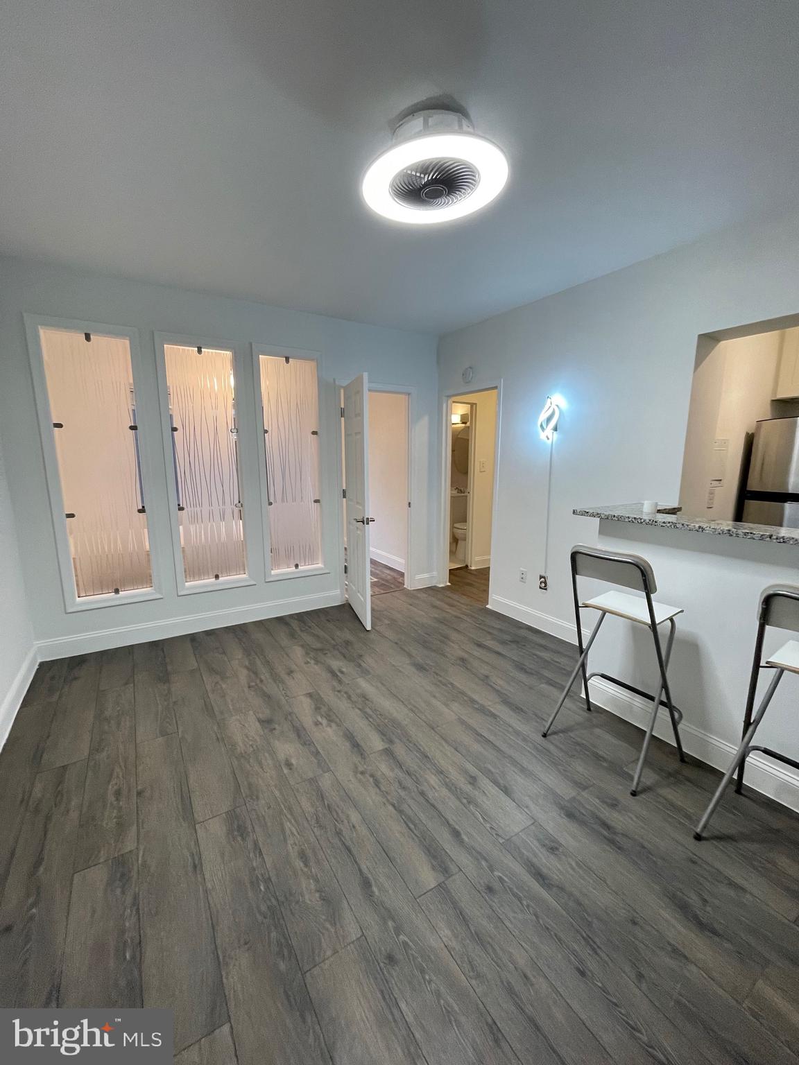 1 Scott Circle Northwest, Unit 118 Washington, DC 20005 - Photo 20 of 35 a view of a livingroom with furniture nad wooden floor