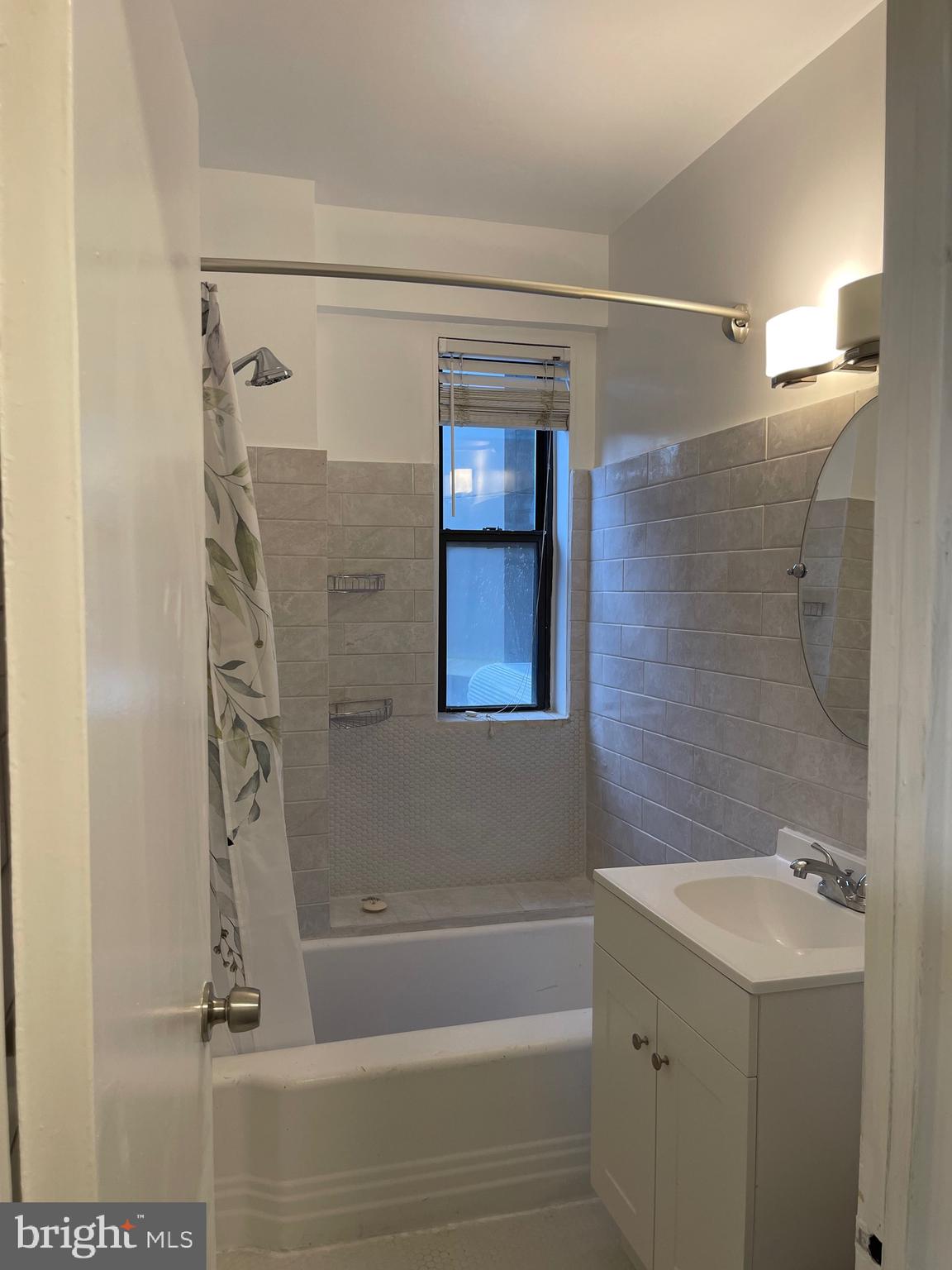 1 Scott Circle Northwest, Unit 118 Washington, DC 20005 - Photo 25 of 35 a bathroom with a shower and a sink