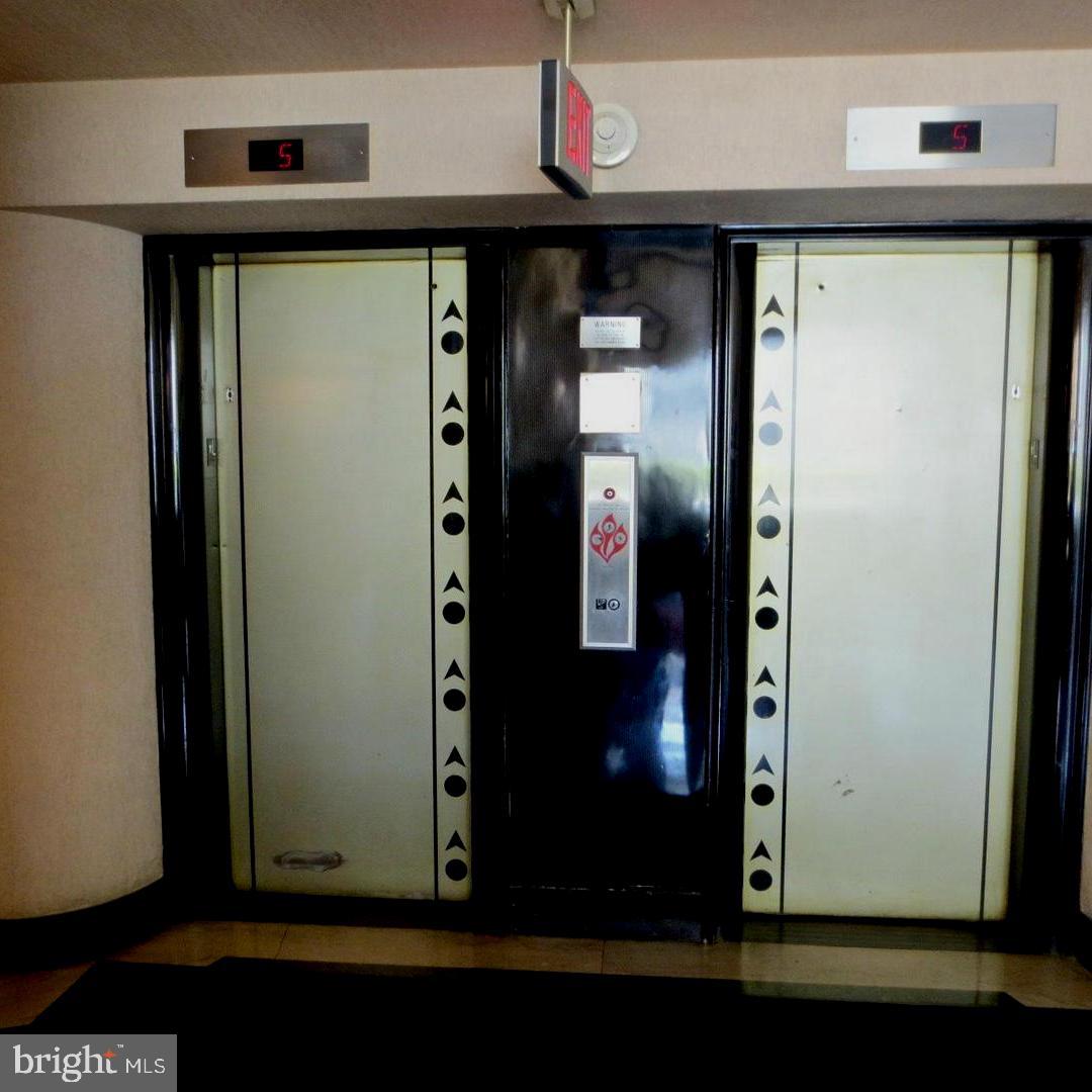 1 Scott Circle Northwest, Unit 118 Washington, DC 20005 - Photo 4 of 35 a view of a hallway with wooden floor