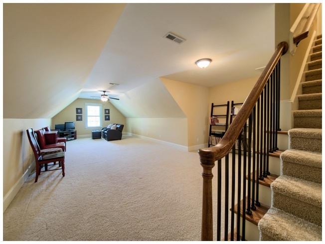 9709 Bailey Grove Court Raleigh, NC 27613 - Photo 21 of 25 Bonus room offers a finished staircase to the 3rd floor walk up attic Bonus Room