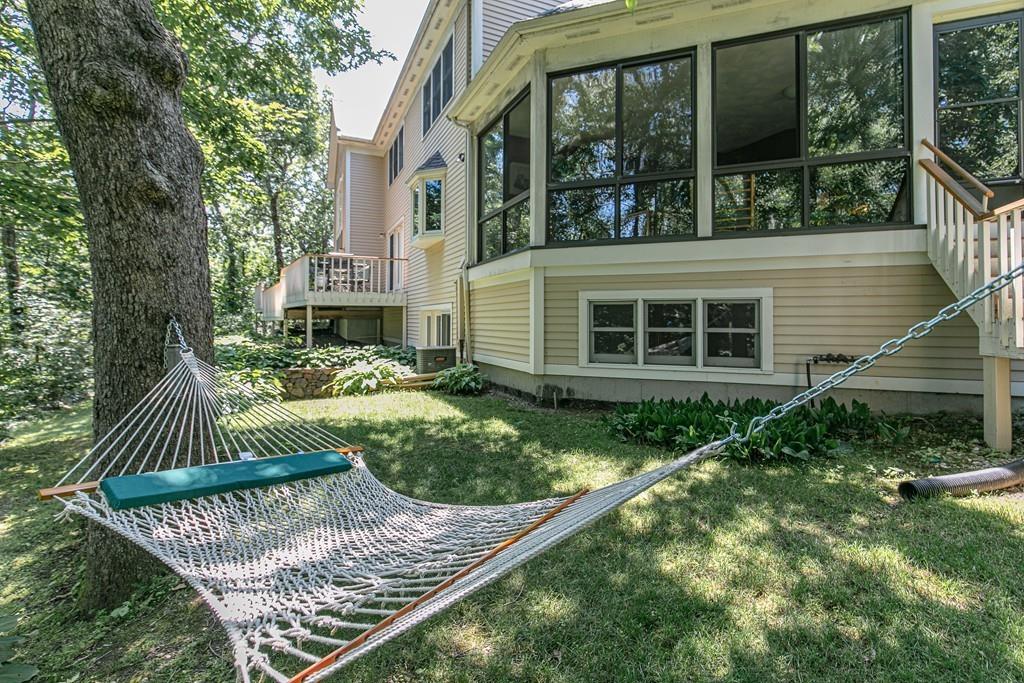 2 Sunset Ridge Lexington, MA 02421 - Photo 33 of 35 a view of house with backyard and outdoor seating
